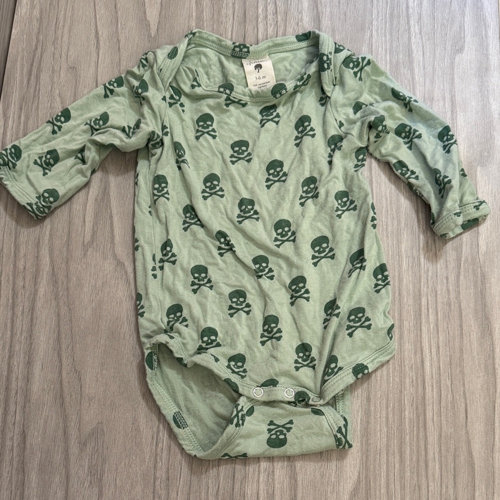 Kate Quinn Olive Skull Print Baby Onesie